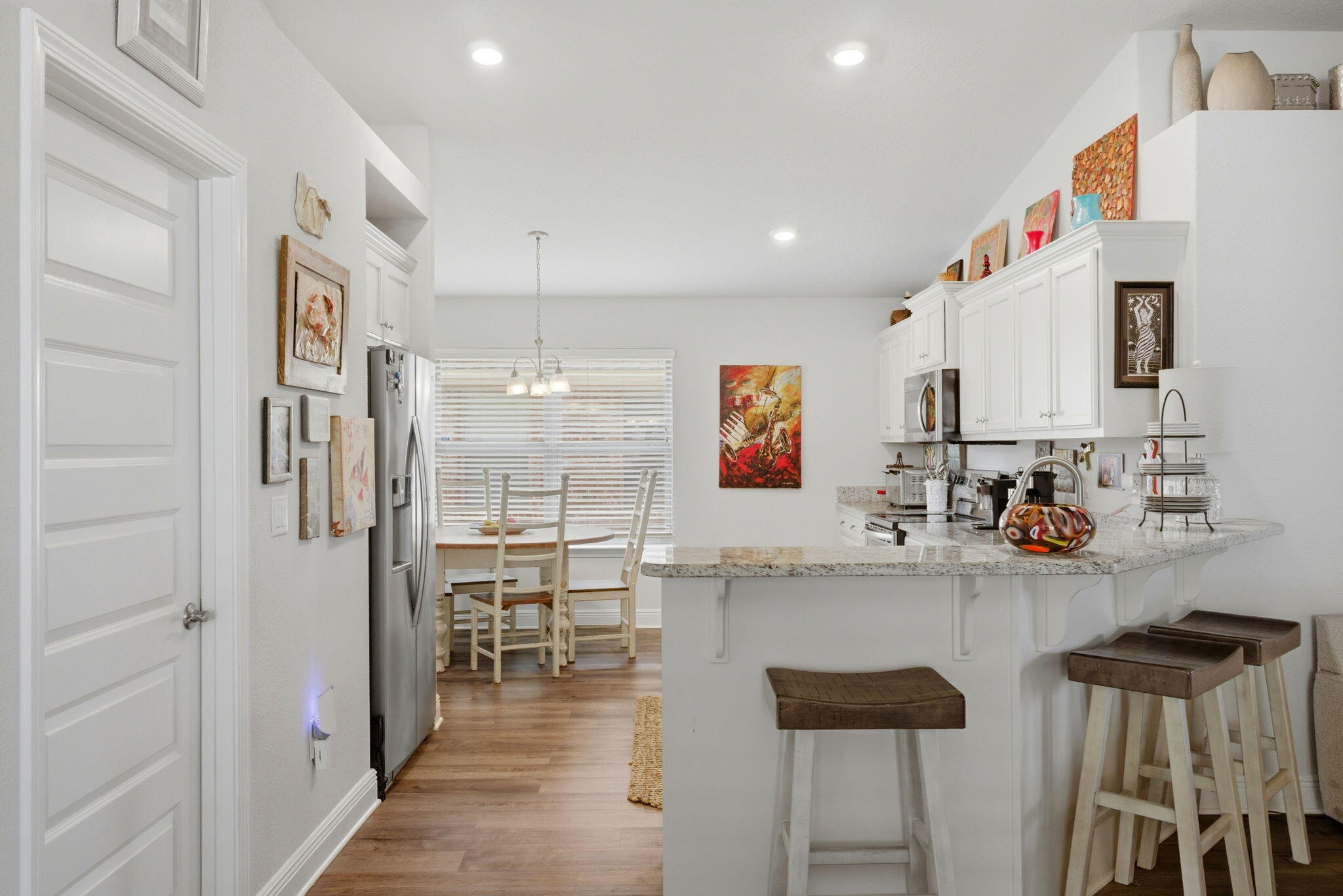 142 Ridgeway Circle Crestview, FL 32536 - Photo 11 of 41 a kitchen with stainless steel appliances granite countertop a refrigerator and a stove top oven