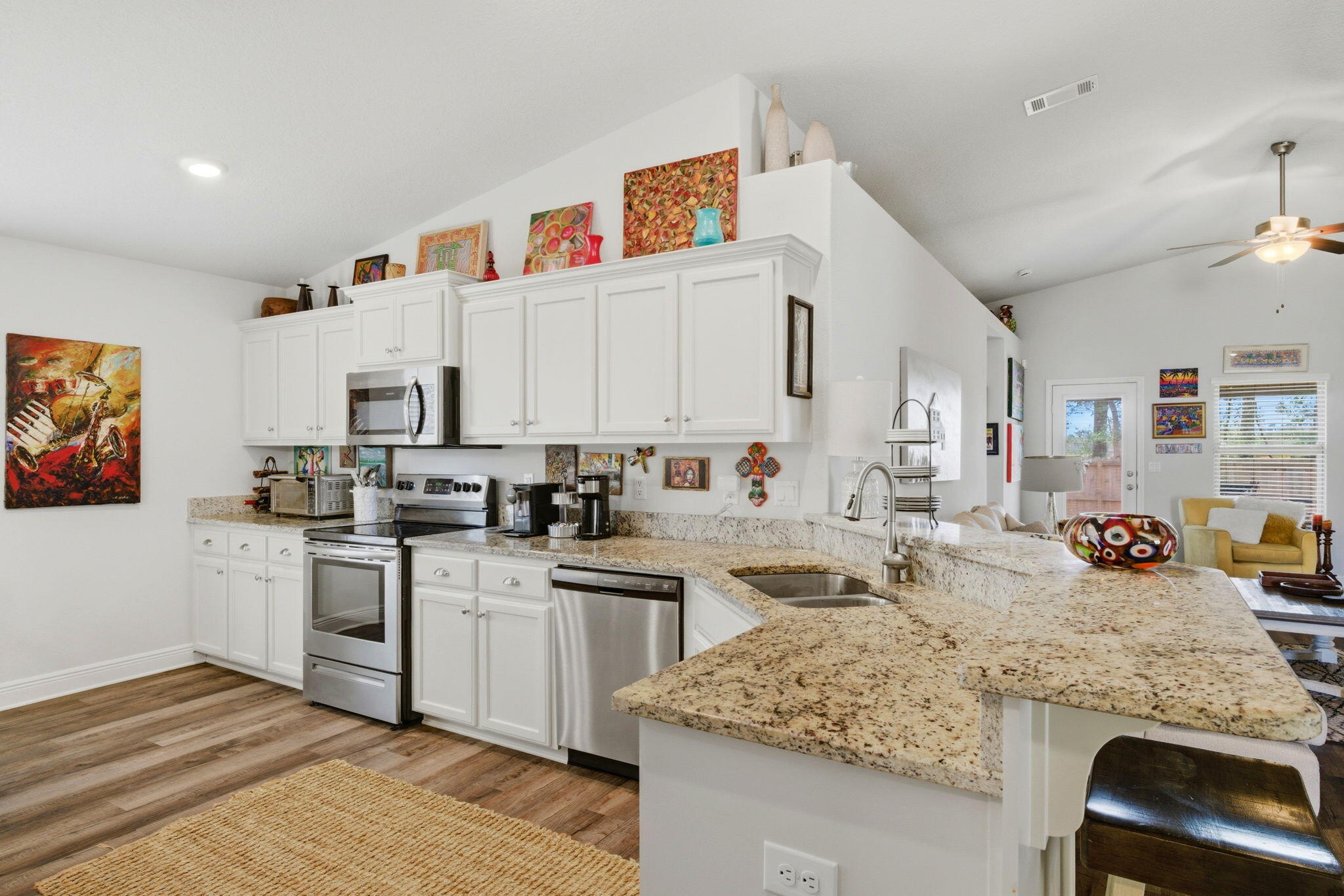 142 Ridgeway Circle Crestview, FL 32536 - Photo 12 of 41 a kitchen with cabinets a sink and appliances