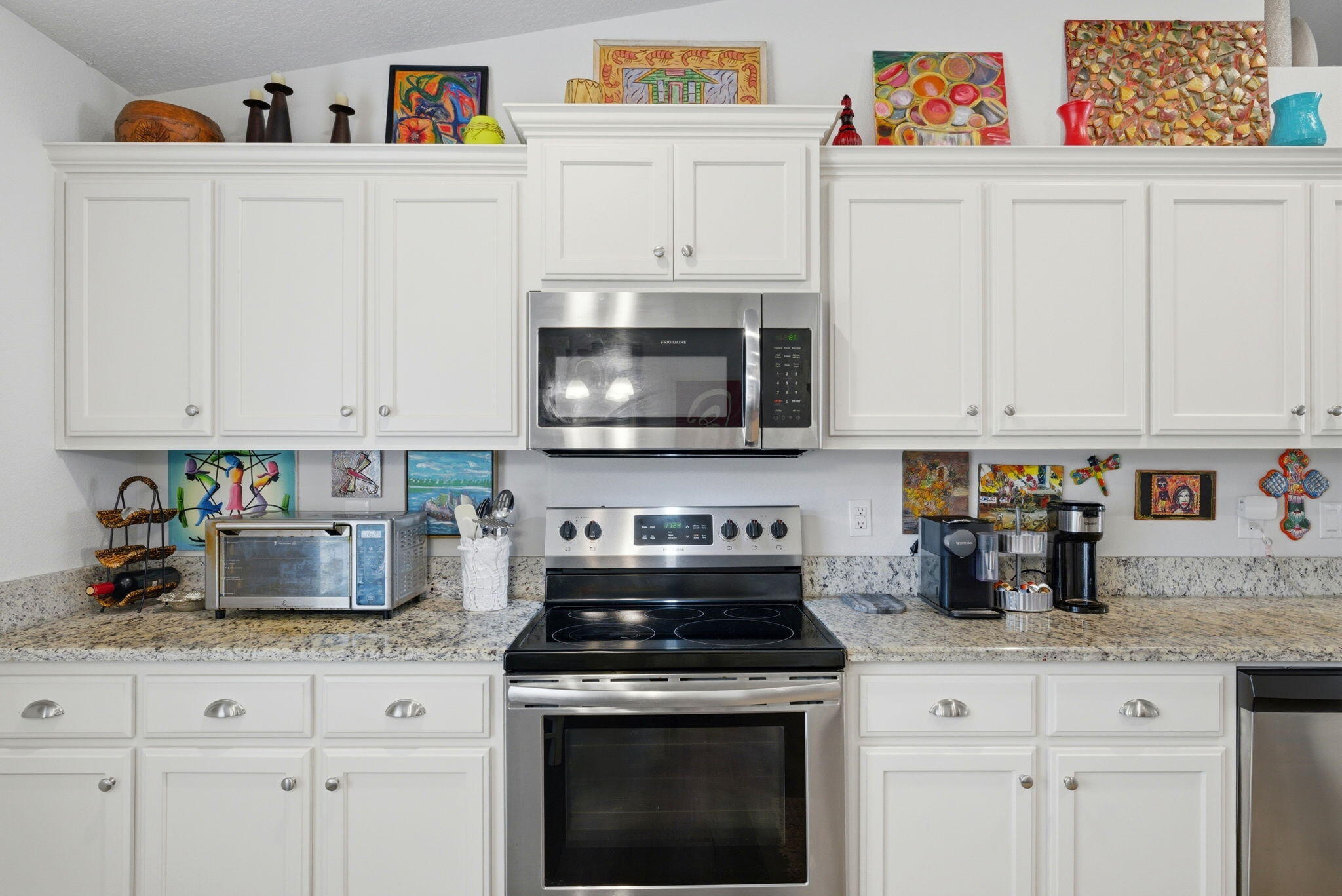 142 Ridgeway Circle Crestview, FL 32536 - Photo 14 of 41 a kitchen with white cabinets and appliances