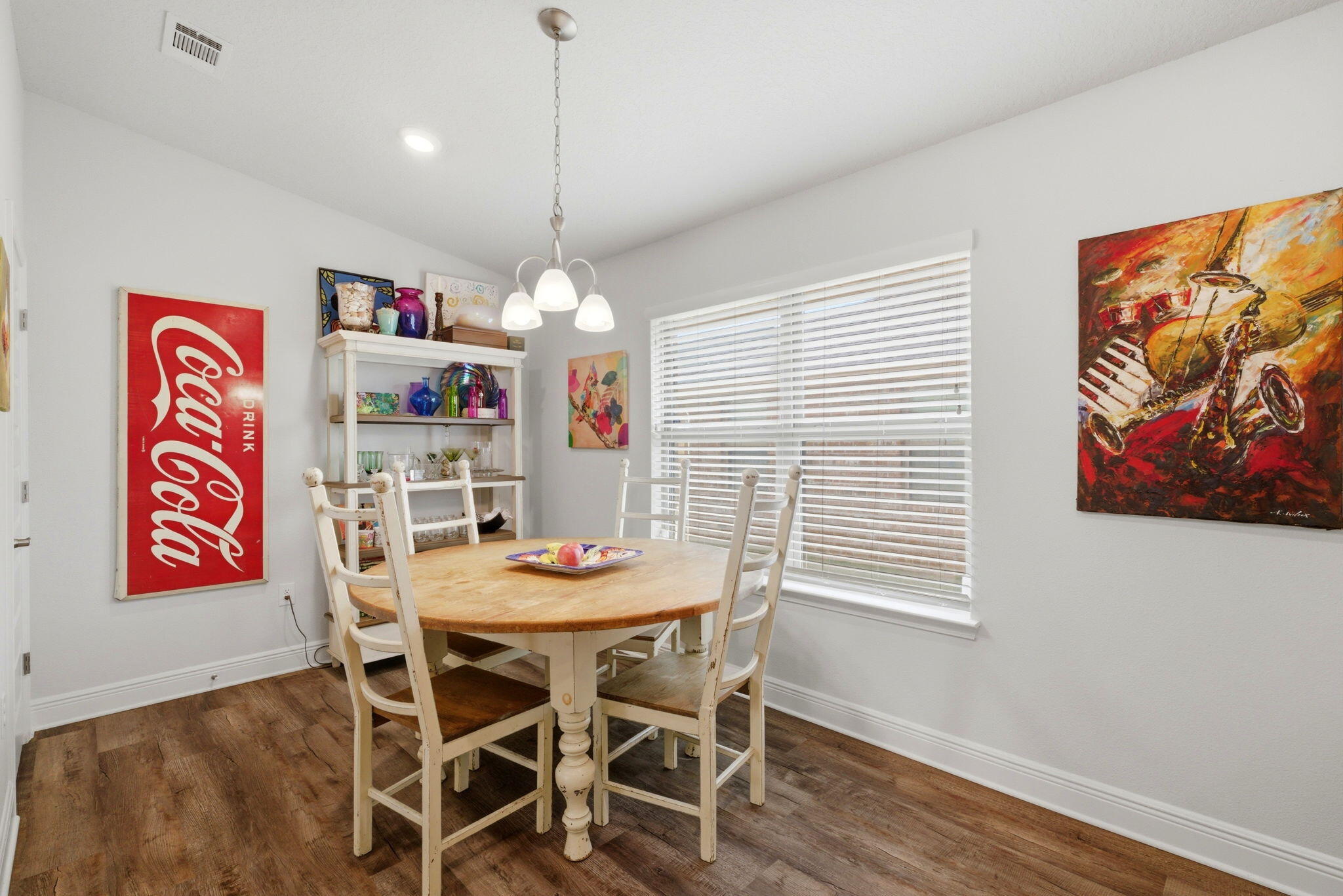 142 Ridgeway Circle Crestview, FL 32536 - Photo 15 of 41 a view of a dining room with furniture wooden floor and a chandelier