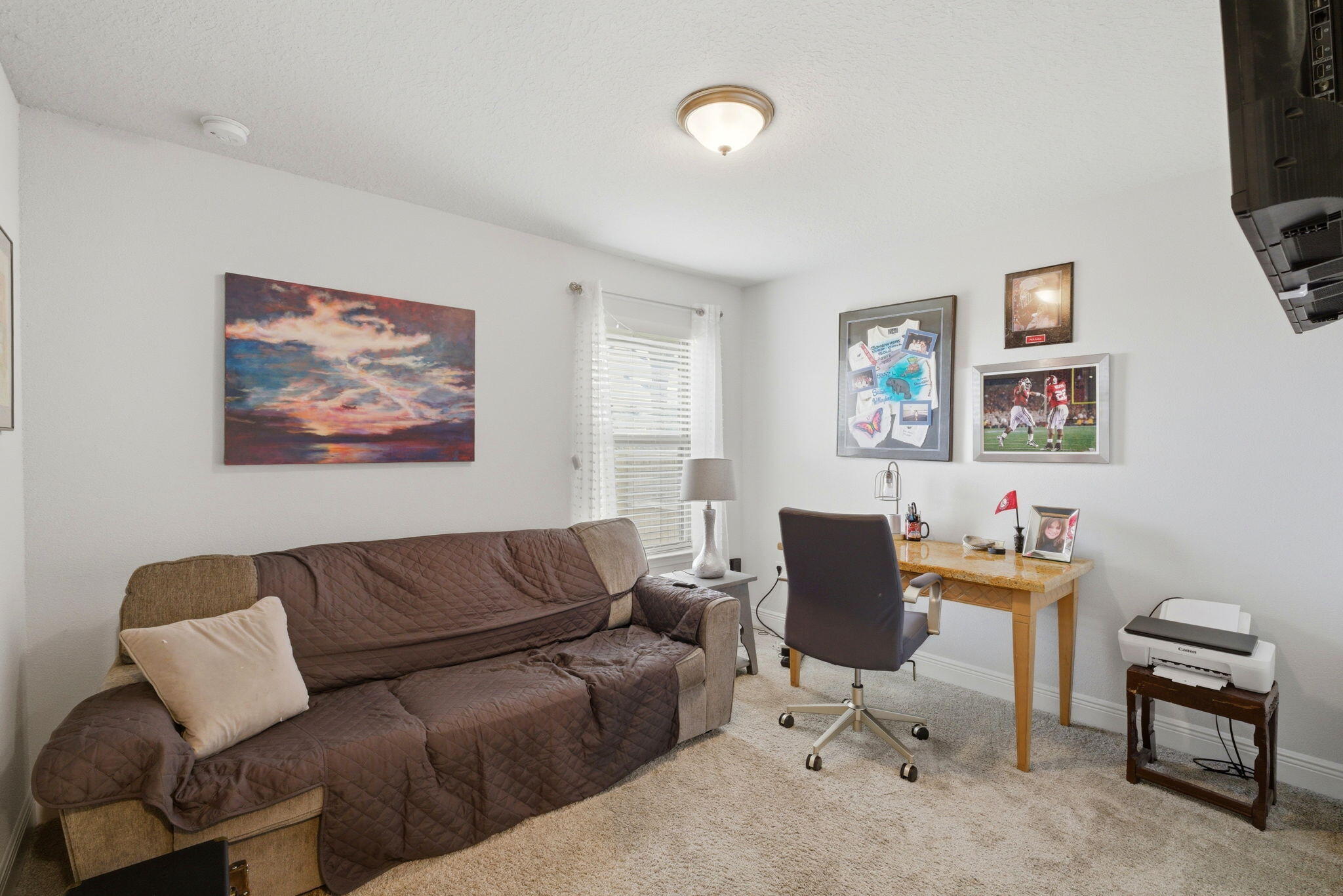 142 Ridgeway Circle Crestview, FL 32536 - Photo 34 of 41 a living room with furniture and a flat screen tv