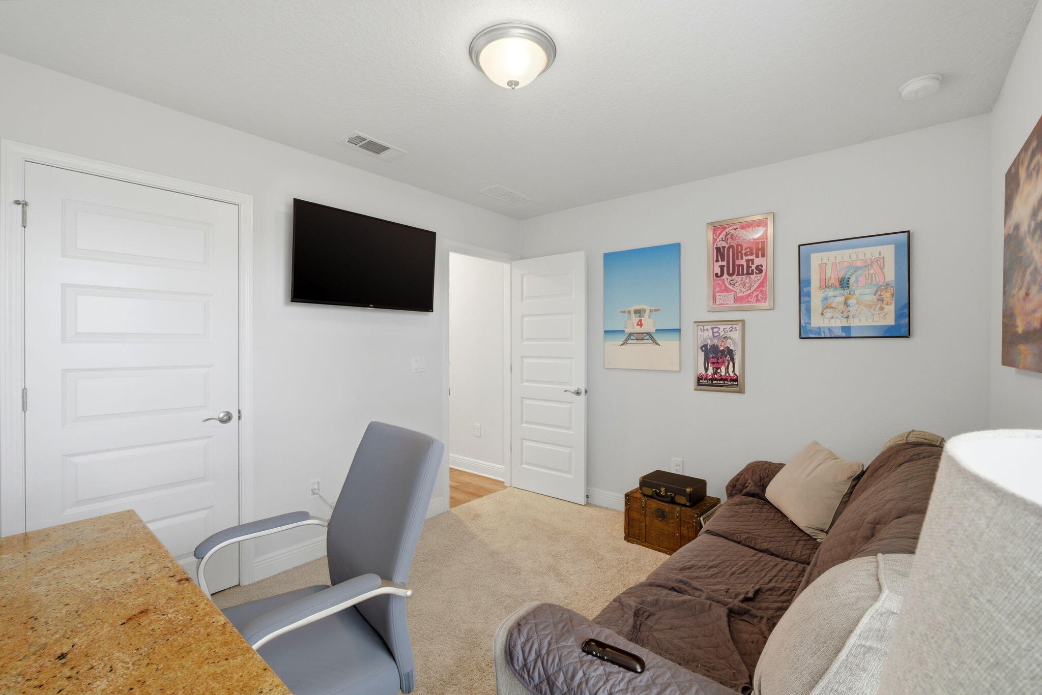 142 Ridgeway Circle Crestview, FL 32536 - Photo 36 of 41 a living room with furniture and a flat screen tv