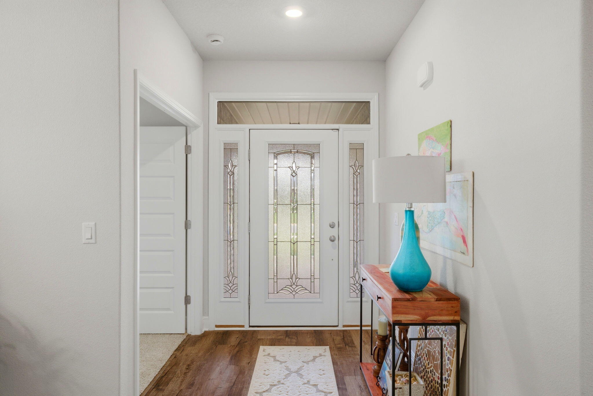 142 Ridgeway Circle Crestview, FL 32536 - Photo 6 of 41 a view of an entryway with wooden floor