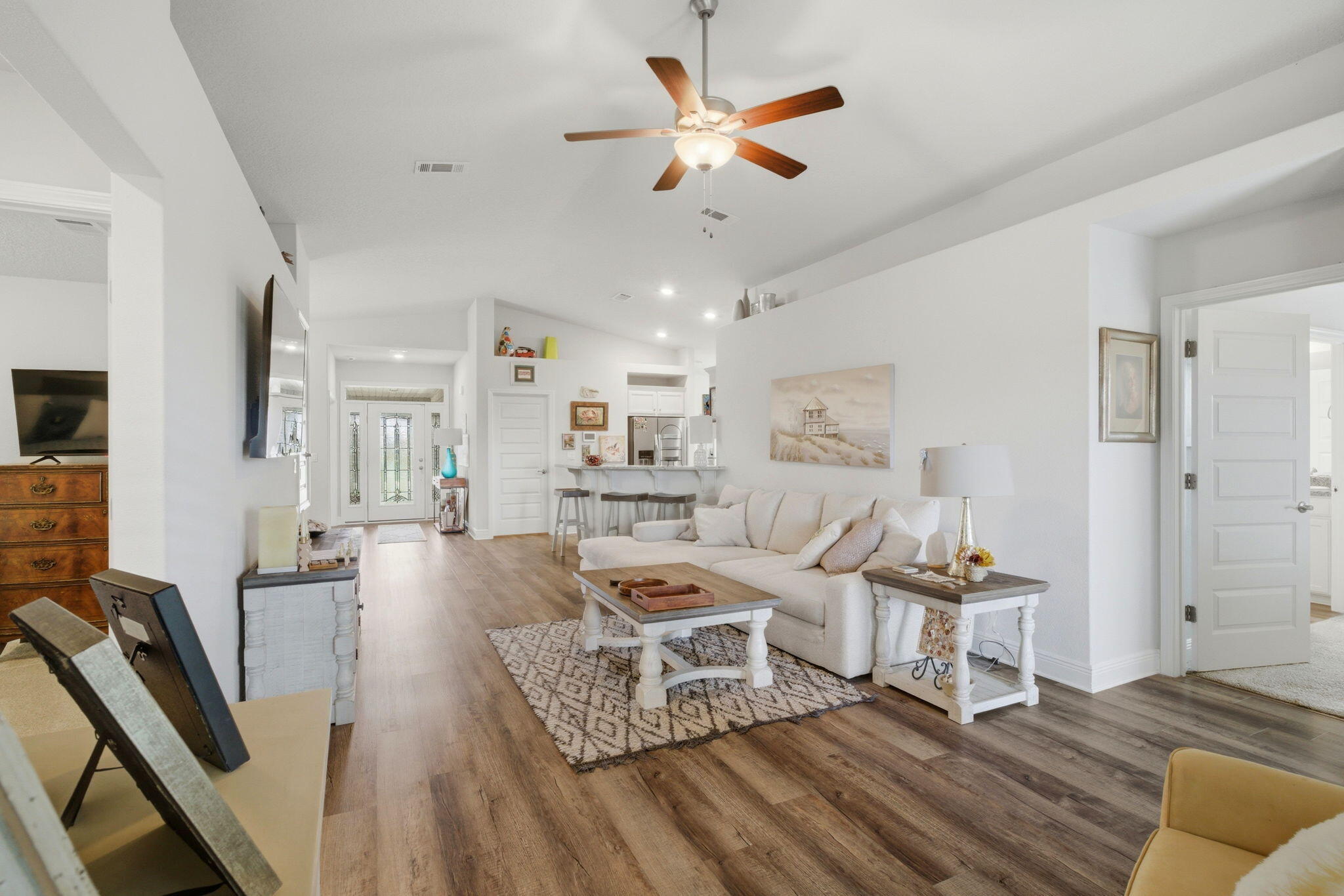 142 Ridgeway Circle Crestview, FL 32536 - Photo 10 of 41 a living room with furniture and a flat screen tv