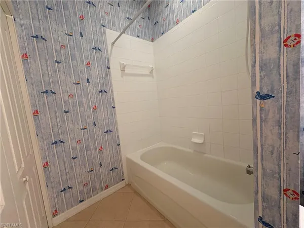 a bathroom with a bathtub