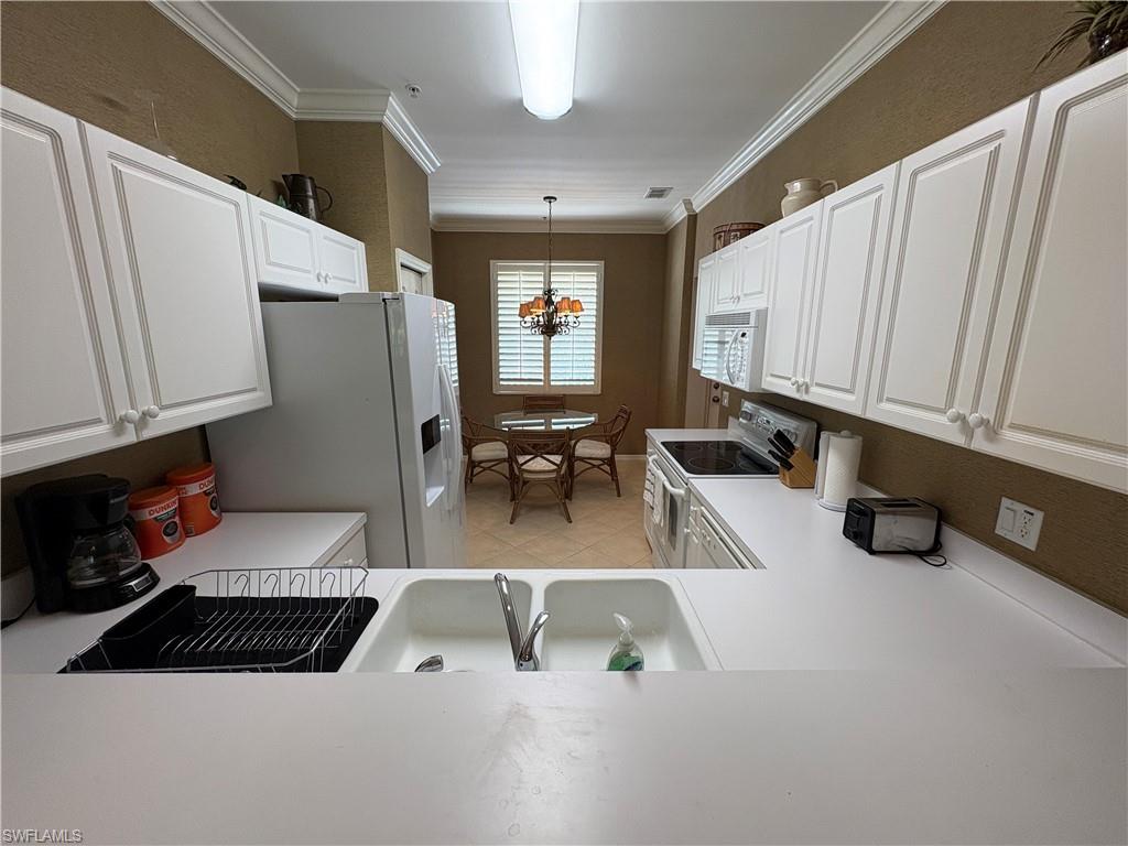 2720 Cypress Trace Circle, Unit 2933 Naples, FL 34119 - Photo 6 of 30