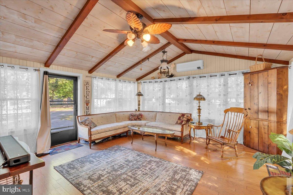 56 Main Street Port Republic, NJ 08241 - Photo 18 of 44 a living room with furniture and wooden floor