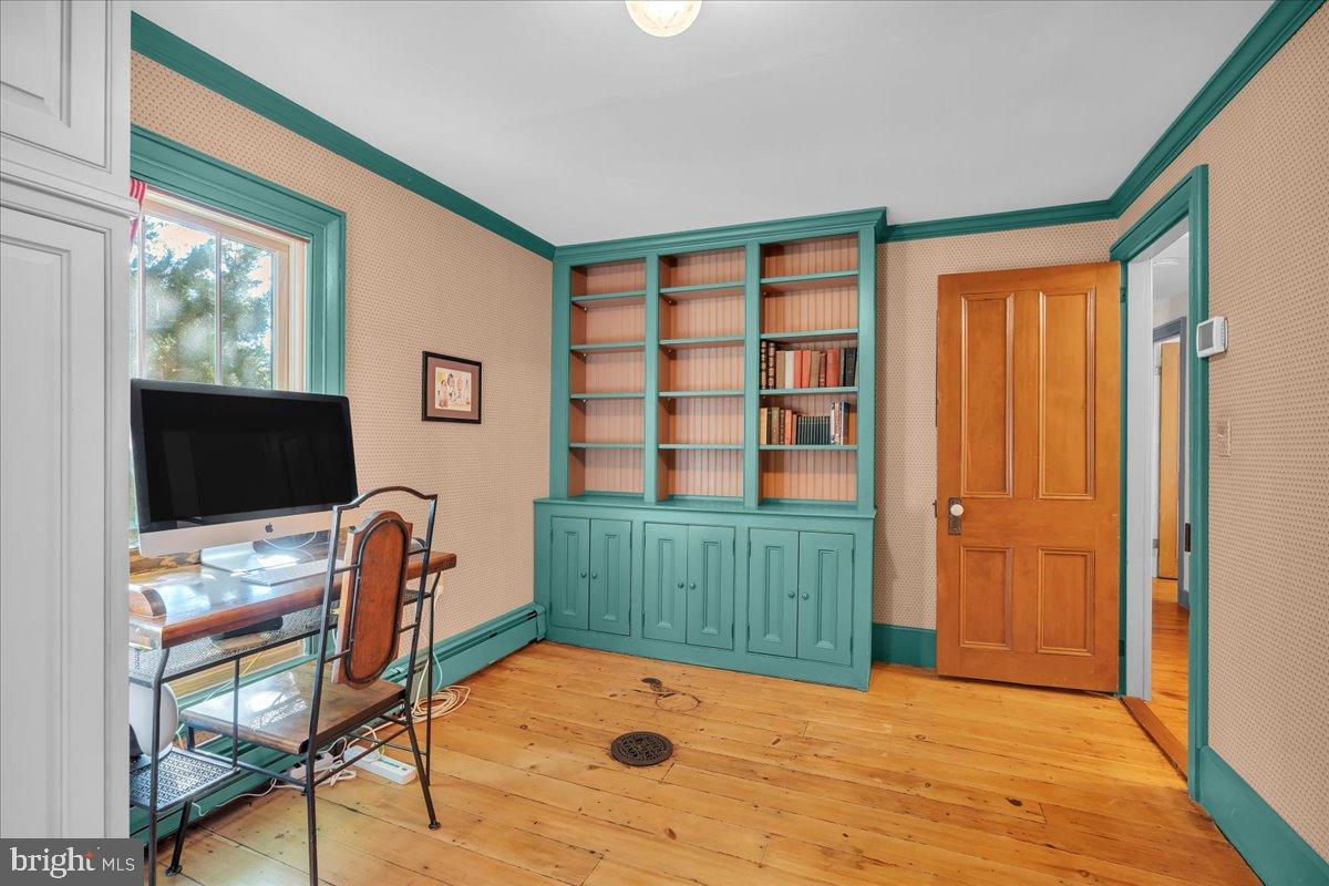 56 Main Street Port Republic, NJ 08241 - Photo 28 of 44 a view of a workspace with furniture and a window