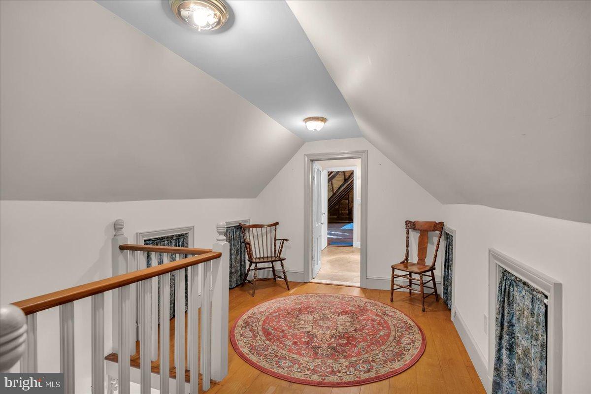 56 Main Street Port Republic, NJ 08241 - Photo 32 of 44 a view of a livingroom with furniture and staircase