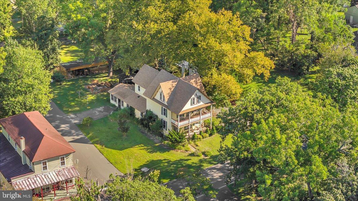 56 Main Street Port Republic, NJ 08241 - Photo 5 of 44 an aerial view of a house with a yard