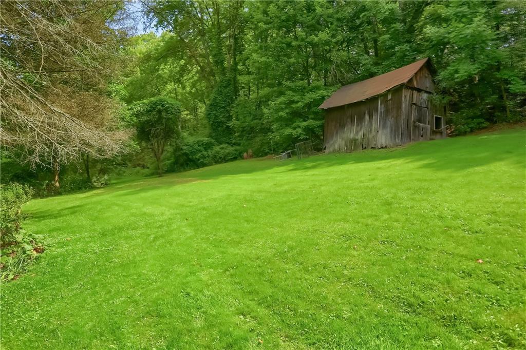 115 Chicora Road Butler, PA 16001 - Photo 10 of 10 a backyard of a house with lots of green space