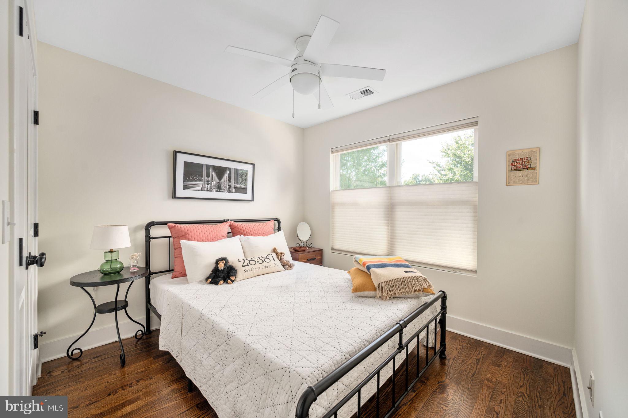 6812 Quander Road Alexandria, VA 22307 - Photo 25 of 41 Guest bedroom with wood floors