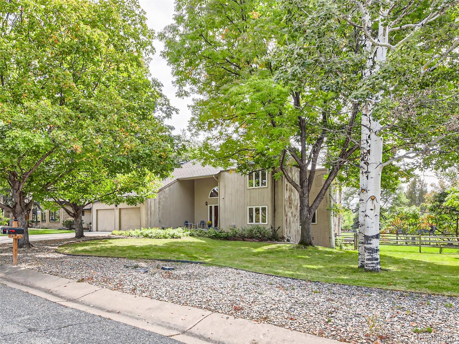 a house with a tree in front of it
