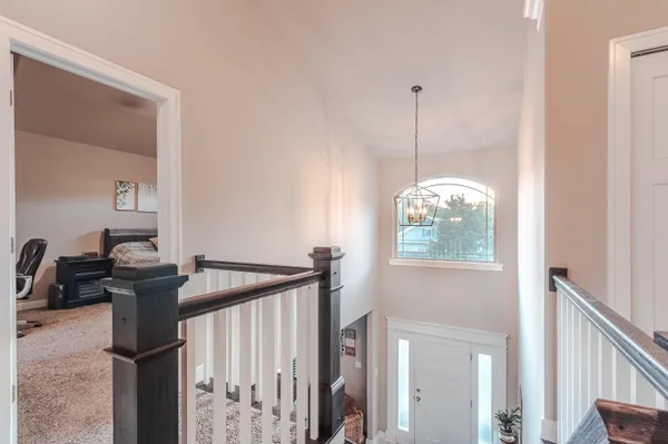 a view of a hallway with windows