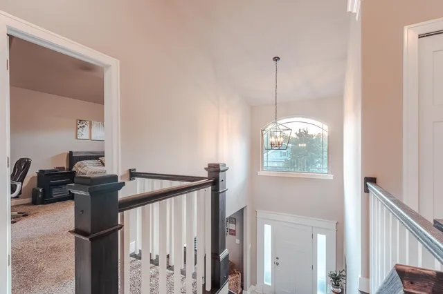 a view of a hallway with windows