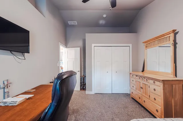 a view of a livingroom with furniture