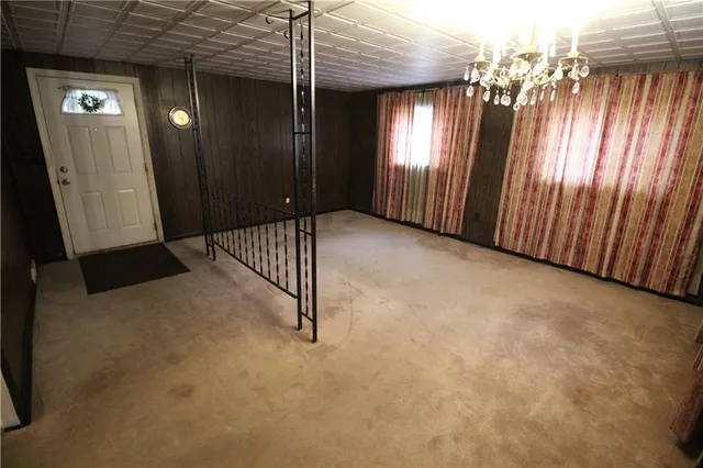 a view of a hallway with windows