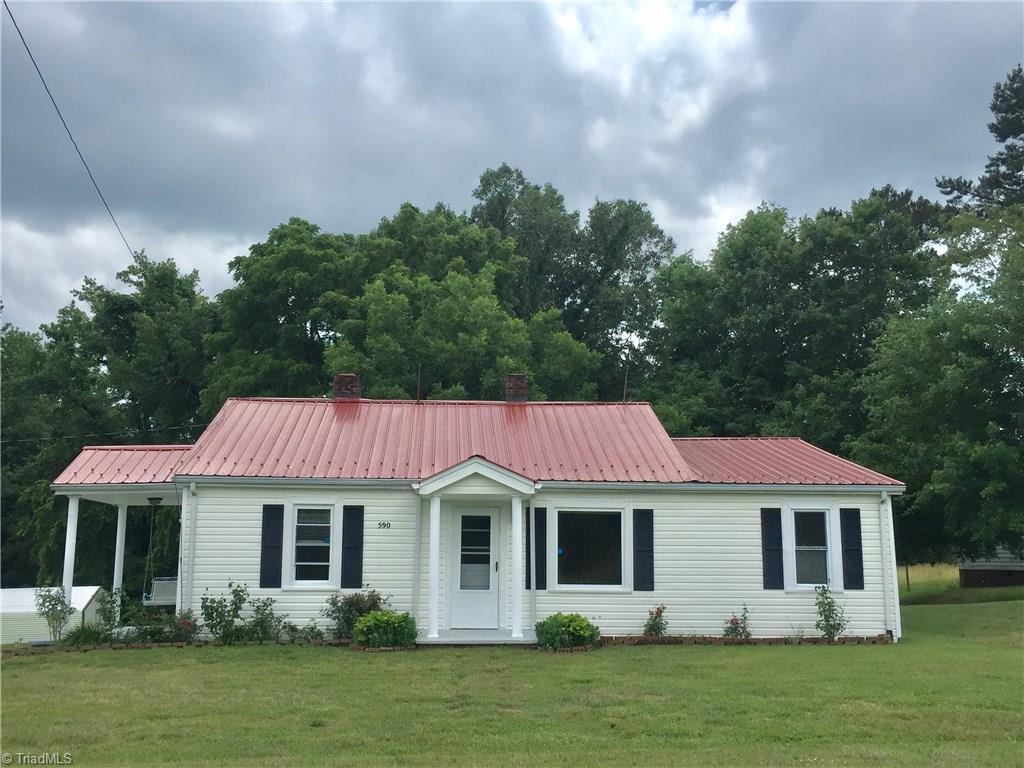 590 Ball Road Thomasville, NC 27360 - Photo 2 of 18 Front with tin roof