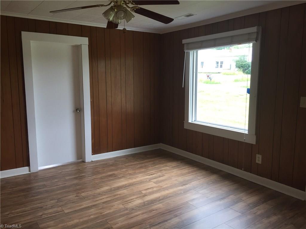 590 Ball Road Thomasville, NC 27360 - Photo 6 of 18 Den looking at 2nd bedroom door