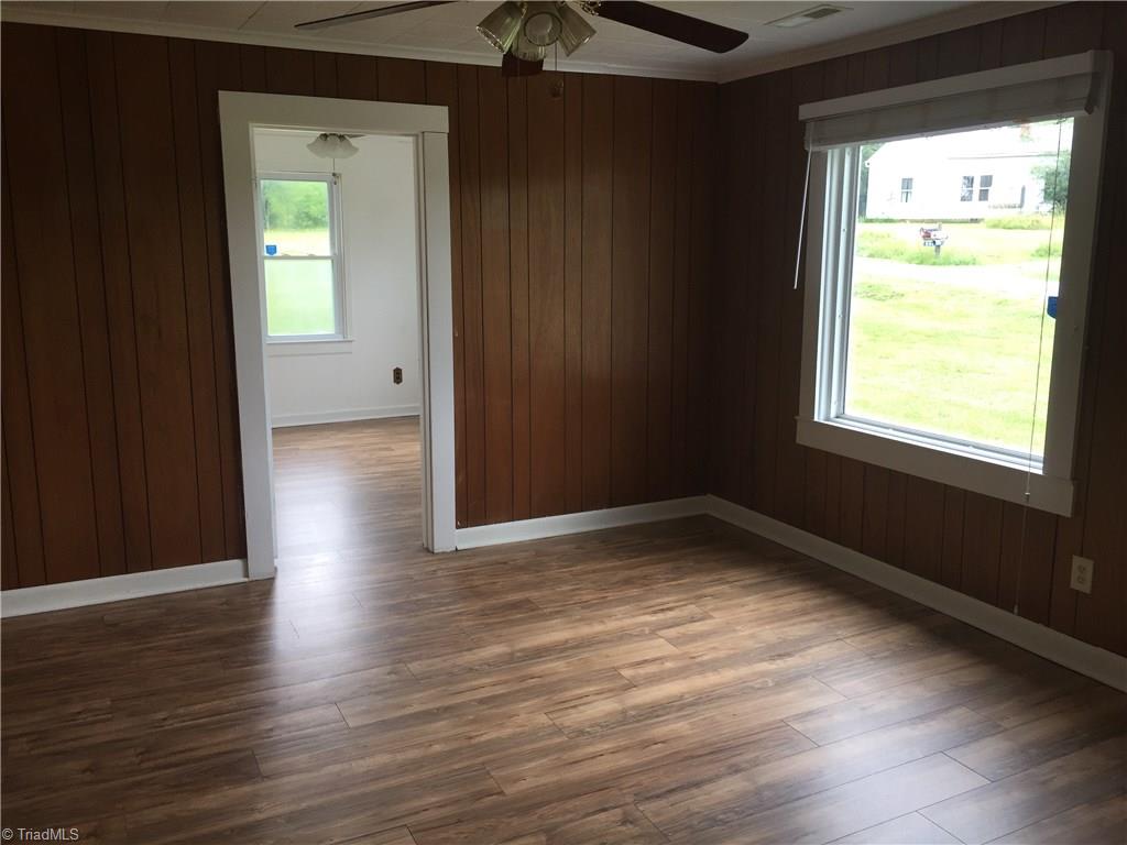 590 Ball Road Thomasville, NC 27360 - Photo 9 of 18 Den looking into 2nd bedroom