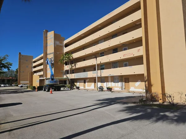 a building exterior with tall building