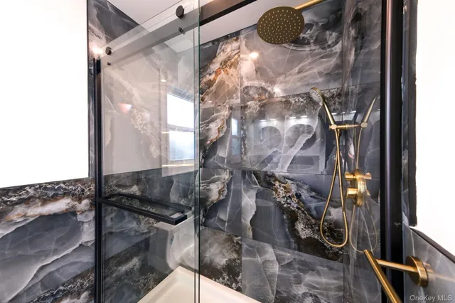 a bathroom with a sink a toilet and a bathtub