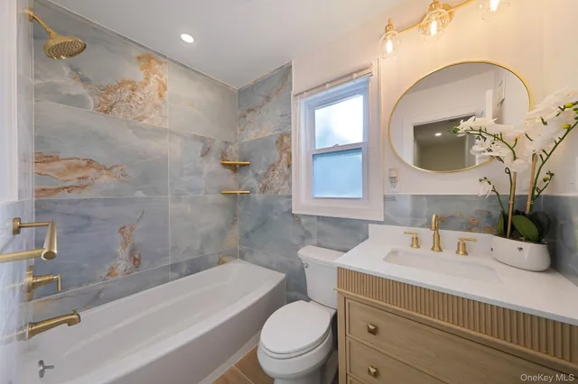 a bath tub sitting next to a bathroom