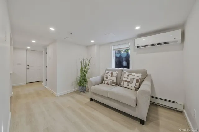 a bathroom with a granite countertop shower and a sink
