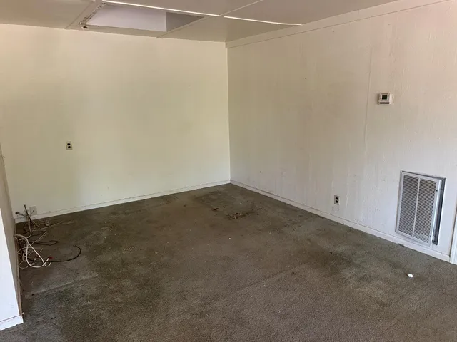 a view of a room with an empty space