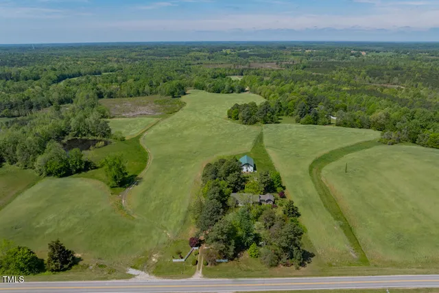 a view of a lake with a yard