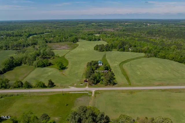 a view of a garden with a lake