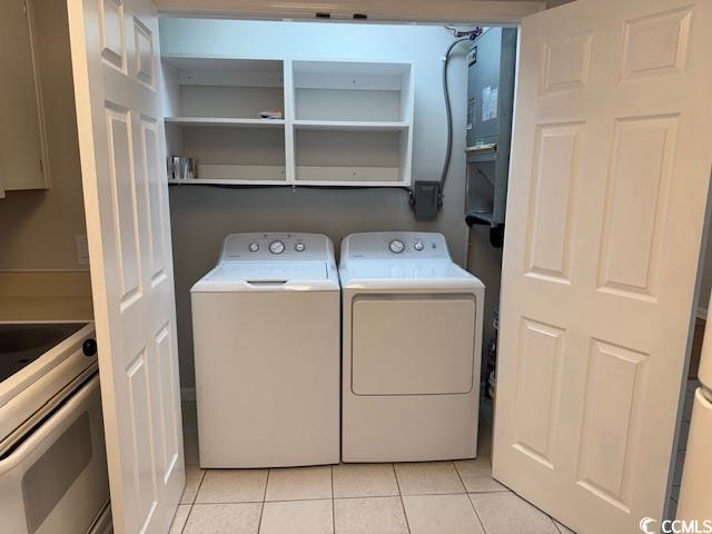 425 Myrtle Greens Drive, Unit B Conway, SC 29526 - Photo 12 of 18 Washroom featuring light tile patterned floors and washer and dryer
