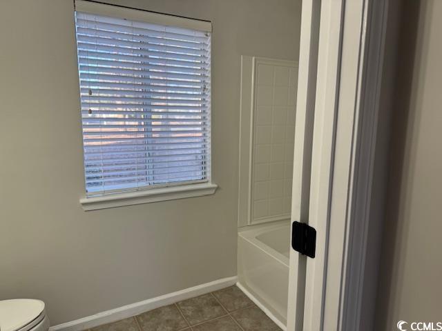 425 Myrtle Greens Drive, Unit B Conway, SC 29526 - Photo 7 of 18 Full bathroom featuring tile patterned flooring and bathtub / shower combination