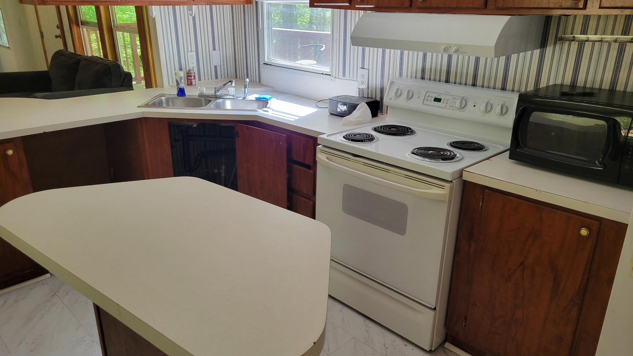 3726 Benders Ferry Road Mount Juliet, TN 37122 - Photo 22 of 25 a kitchen with a sink a stove and cabinets