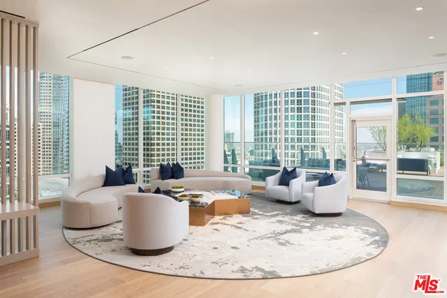 a room with furniture and a large window