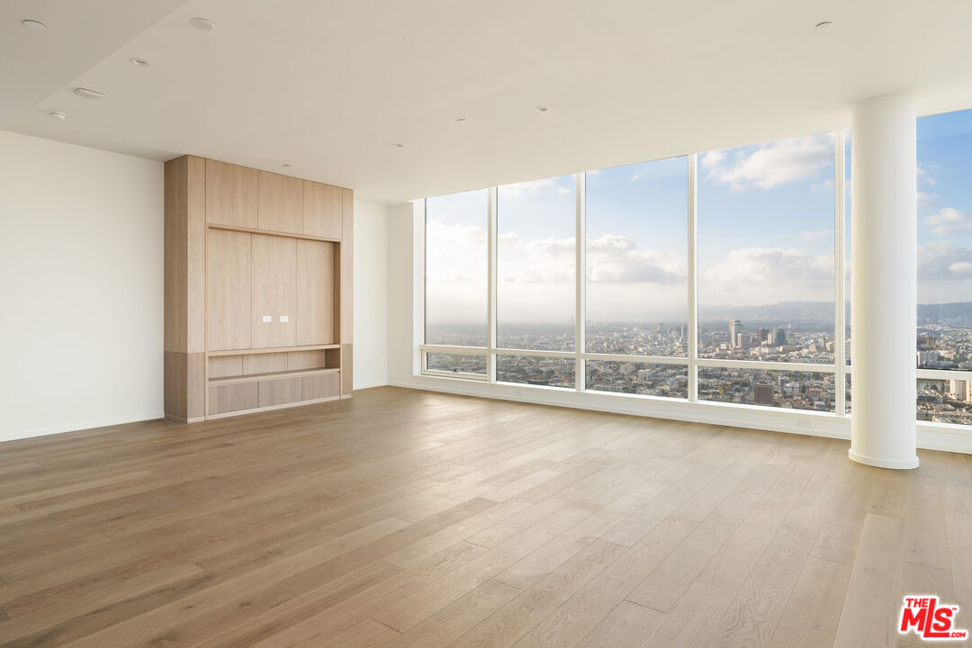 1000 West 8th Street, Unit PH5805 Los Angeles, CA 90017 - Photo 4 of 56 a view of an empty room with a window