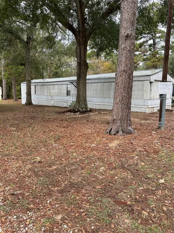 a house with trees in front of it
