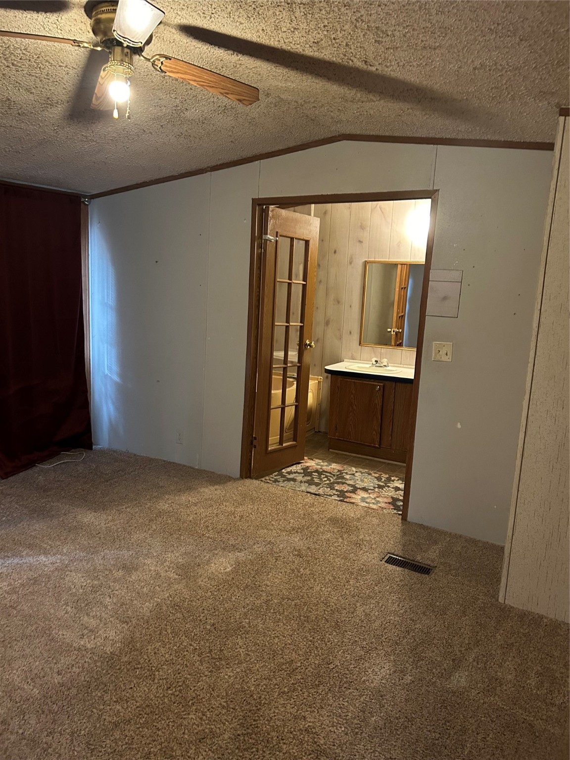 26163 Etta Road, Unit 7 Splendora, TX 77372 - Photo 8 of 10 a view of an empty room with a window