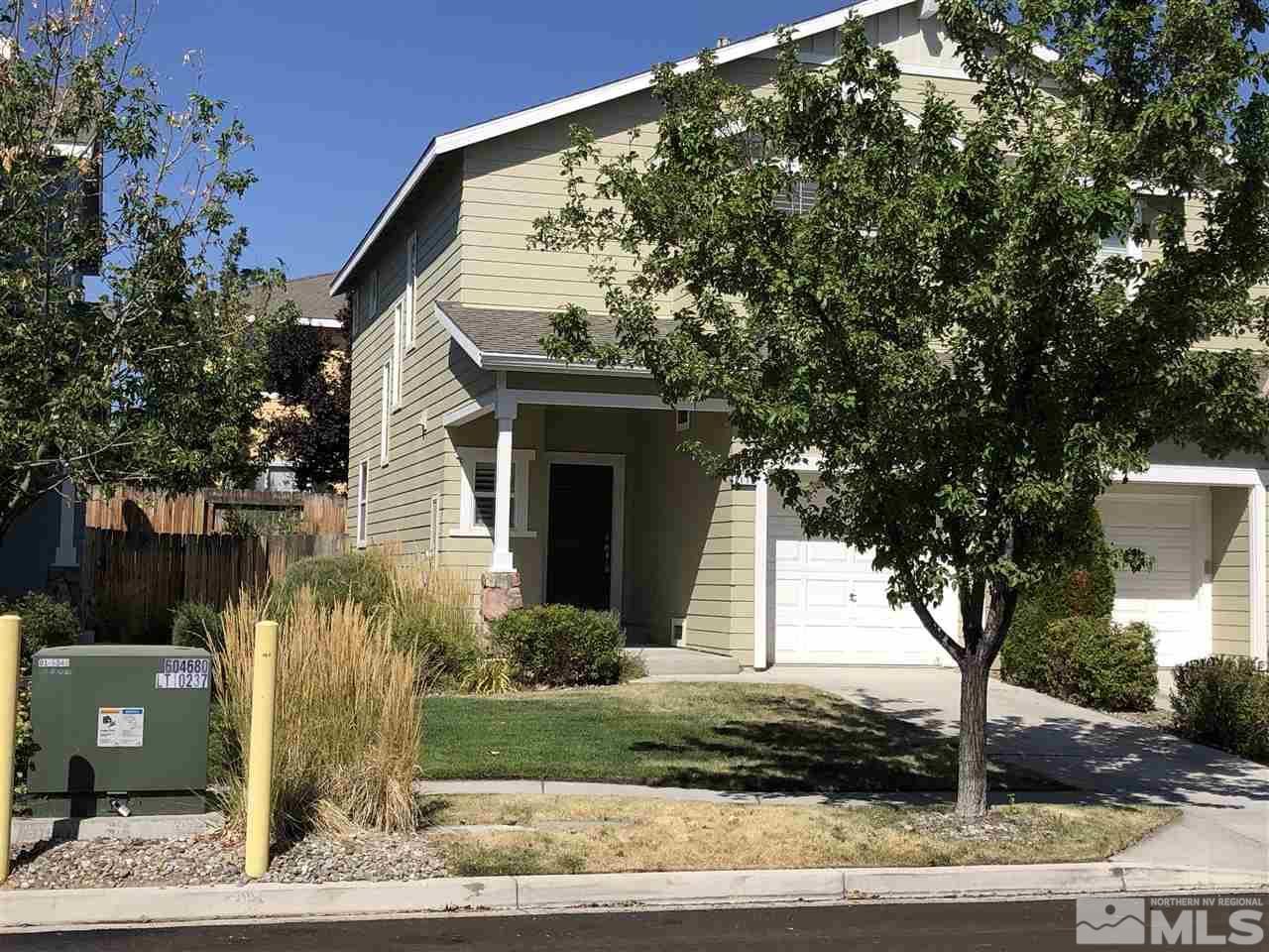 2175 Hellaby Lane Reno, NV 89502 - Photo 1 of 26 a front view of a house with garden