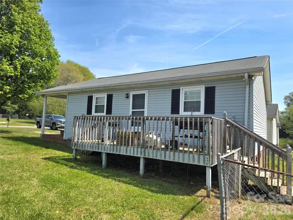 a view of a house with a roof deck