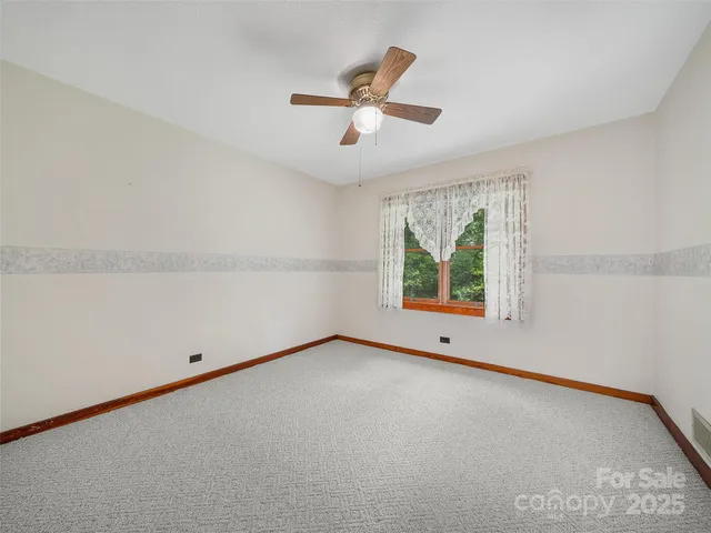 an empty room with window