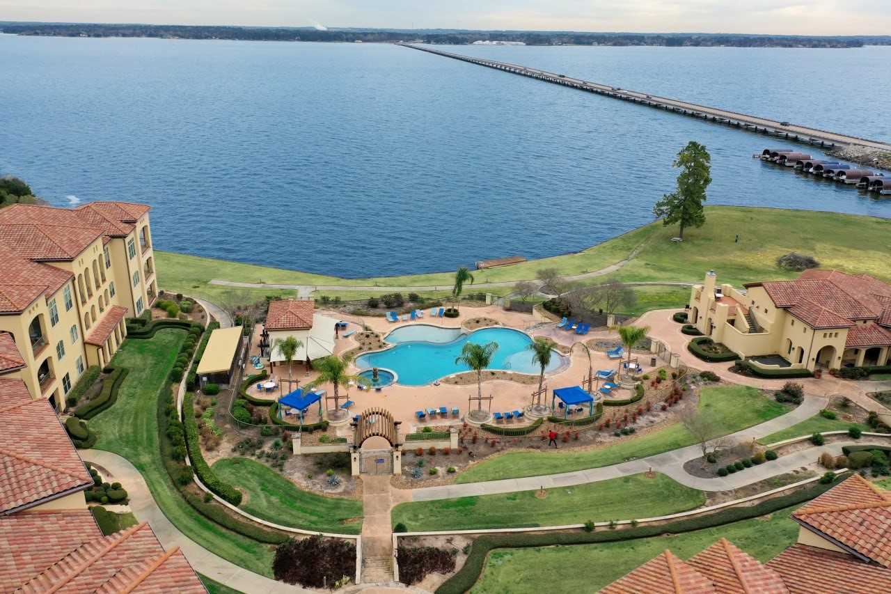 a view of swimming pool with outdoor seating