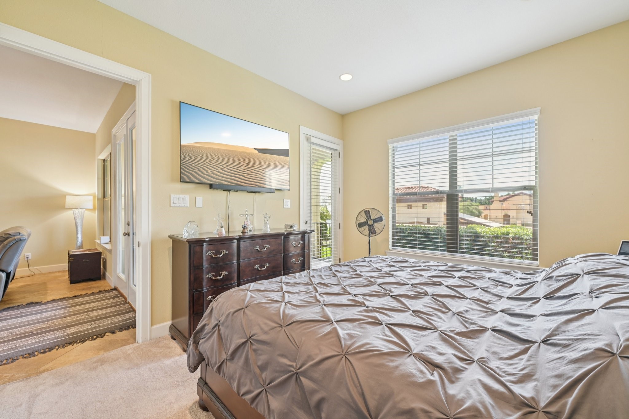 17040 West Fm 1097 Road, Unit 6103 Montgomery, TX 77356 - Photo 16 of 34 a bedroom with a large bed and a large window