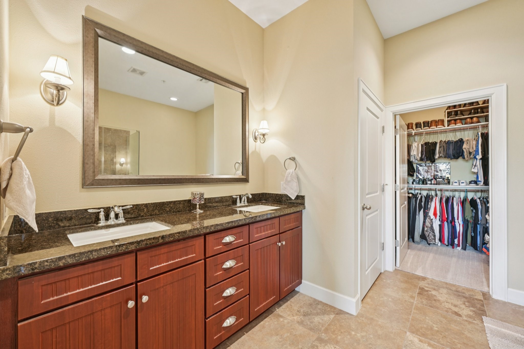 17040 West Fm 1097 Road, Unit 6103 Montgomery, TX 77356 - Photo 19 of 34 a en suite bathroom with a granite countertop sink and a mirror