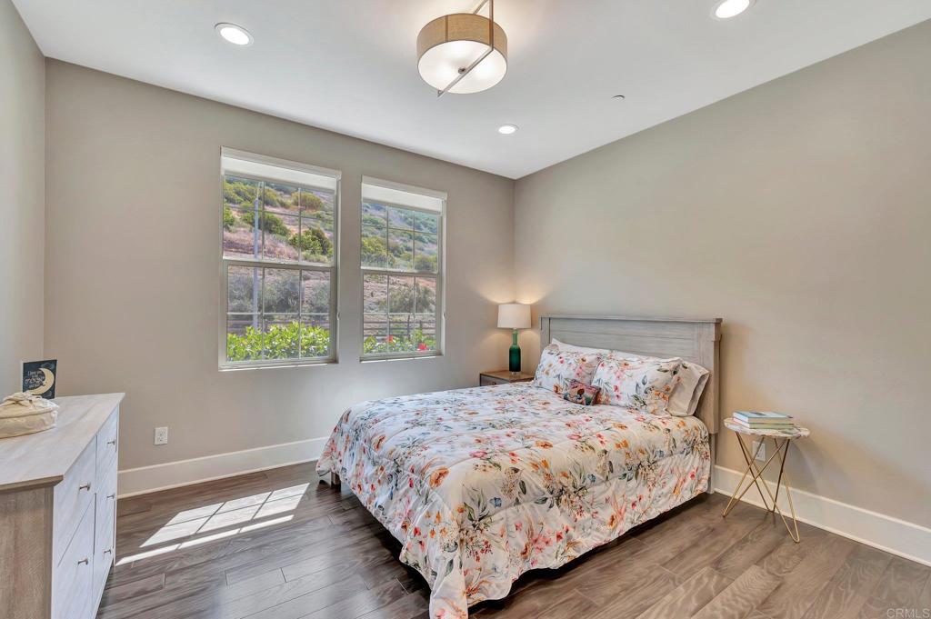 35822 Blue Breton Drive Fallbrook, CA 92028 - Photo 24 of 47 a bedroom with a bed and a window