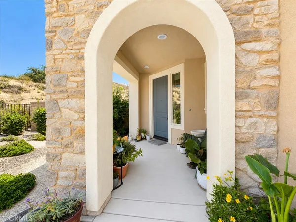 a front view of a house with an outdoor space