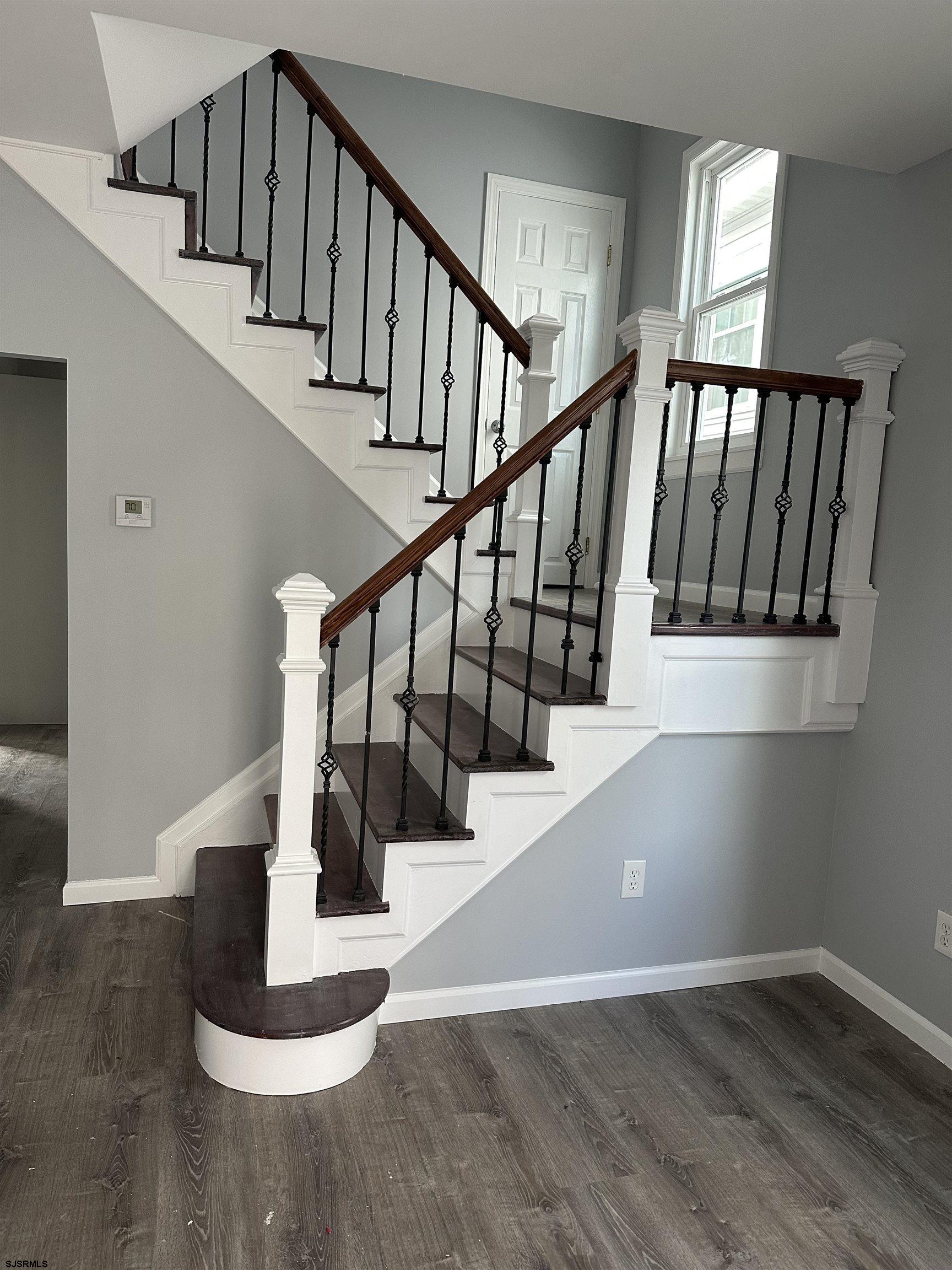 12 South Jackson Avenue, Unit SECOND Atlantic City, NJ 08401 - Photo 3 of 17 a view of entryway and hall with wooden floor