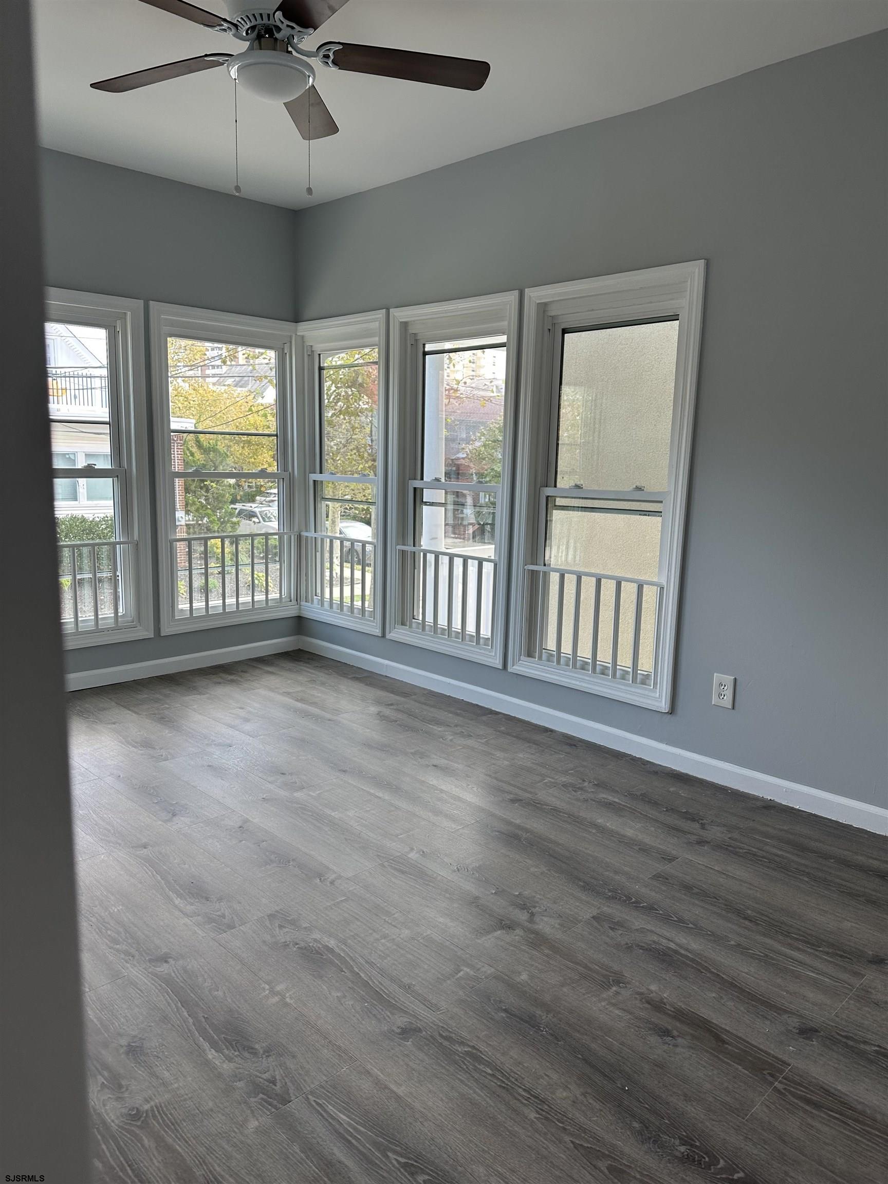 12 South Jackson Avenue, Unit SECOND Atlantic City, NJ 08401 - Photo 7 of 17 a view of an empty room with a window