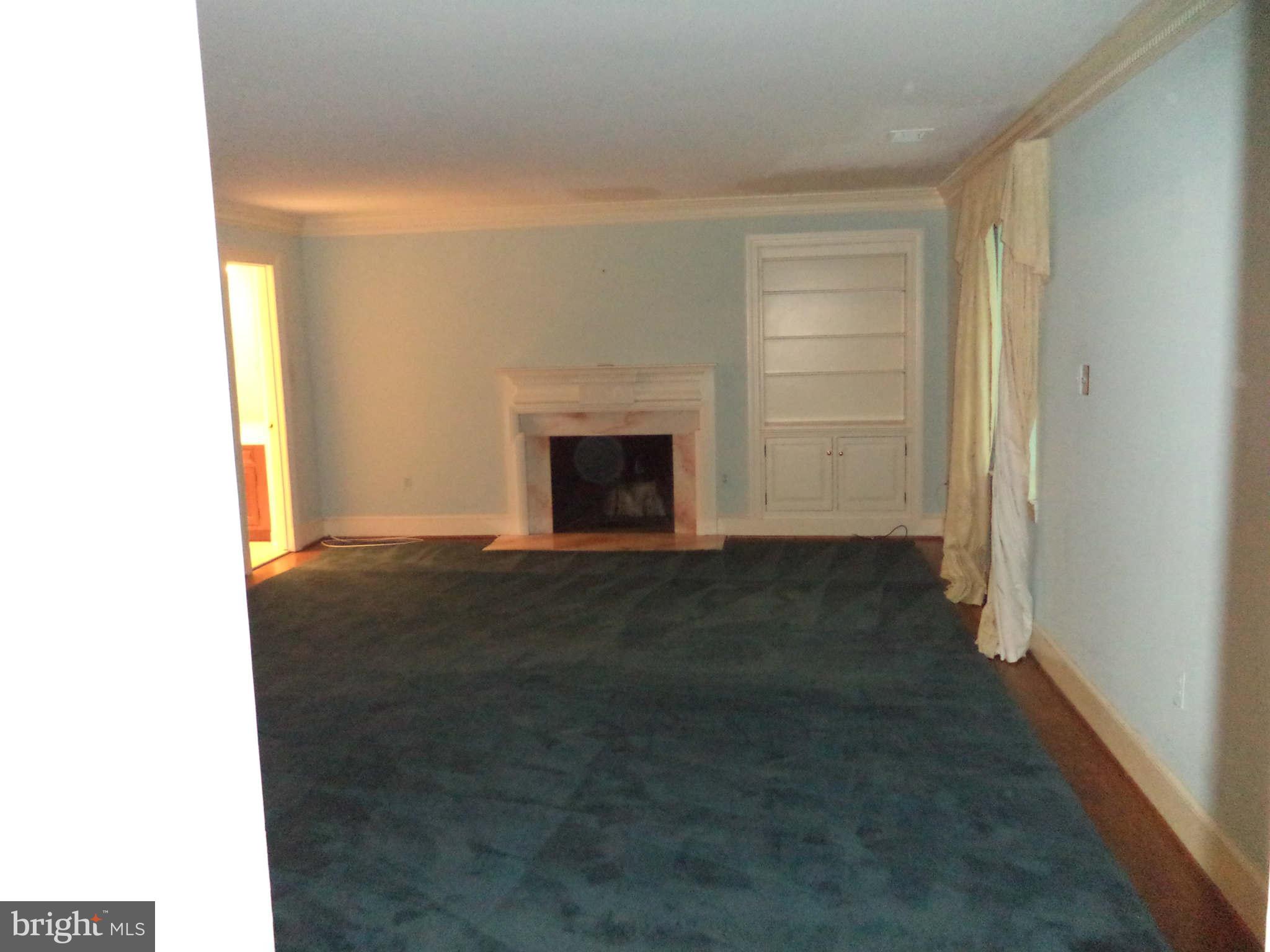 1304 Skipwith Road McLean, VA 22101 - Photo 20 of 25 a view of empty room with a fireplace