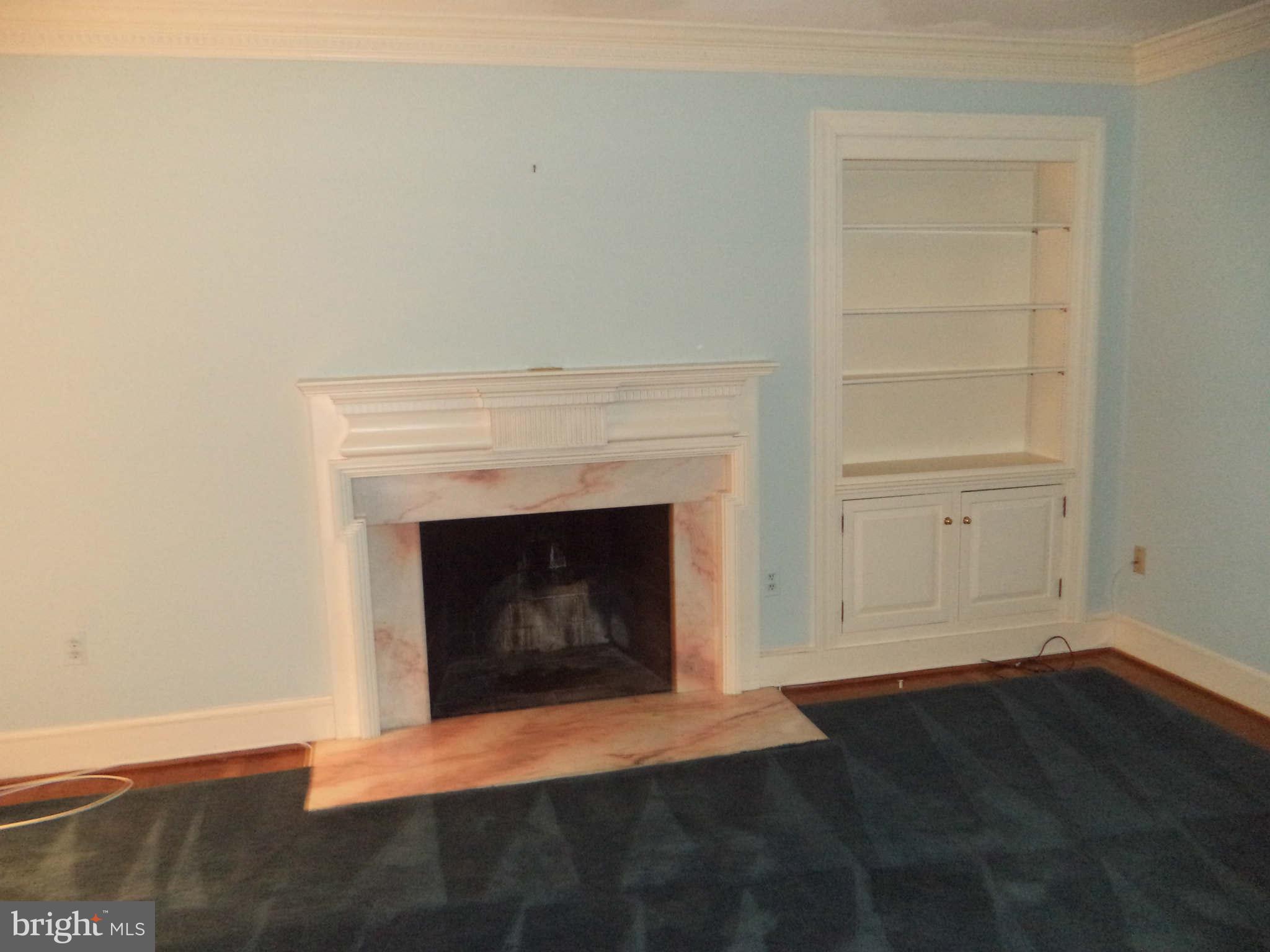 1304 Skipwith Road McLean, VA 22101 - Photo 21 of 25 a living room with a fireplace